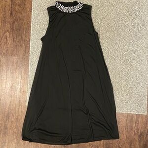 Elegant Black Sleeveless Dress with Embellished Collar